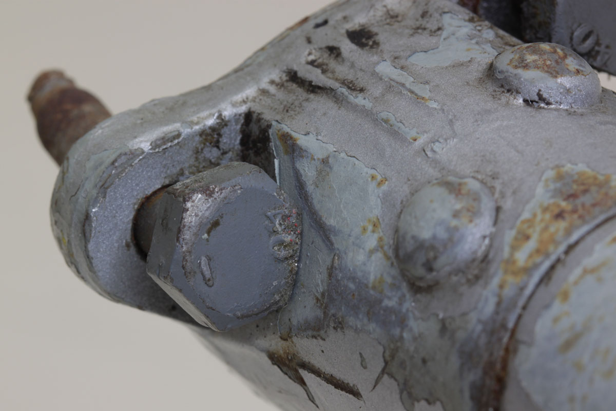 Figure A9: Bolt on right side showing head markings